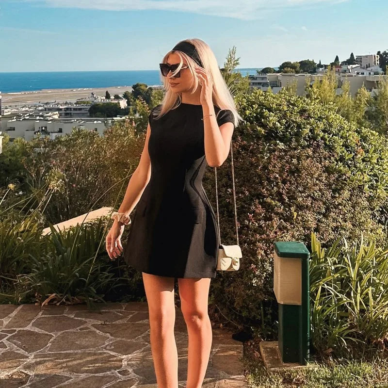 Nora - Chic Mouwloos Mini Jurkje met Zakken Aan De Voorkant