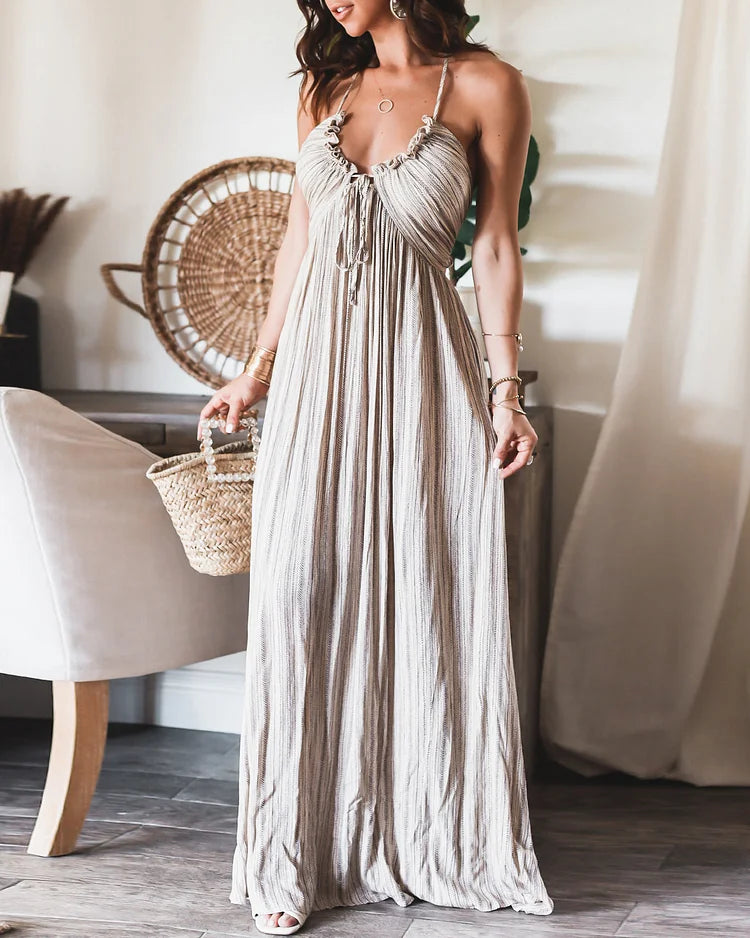 Sienna – Elegante halter maxi-jurk met volant en strikdetail op de rug