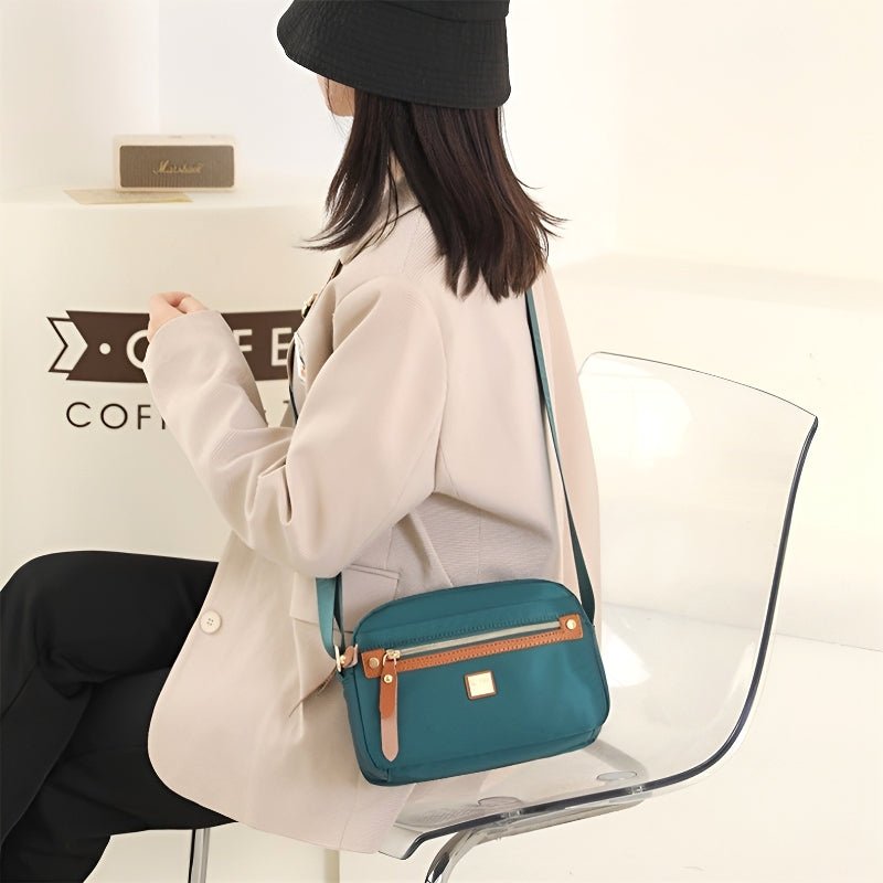 Talia – Lichtgewicht schoudertas met rits aan de voorkant en verstelbare banden