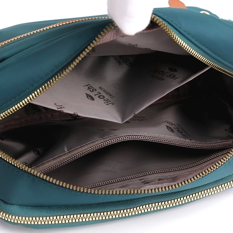 Talia – Lichtgewicht schoudertas met rits aan de voorkant en verstelbare banden