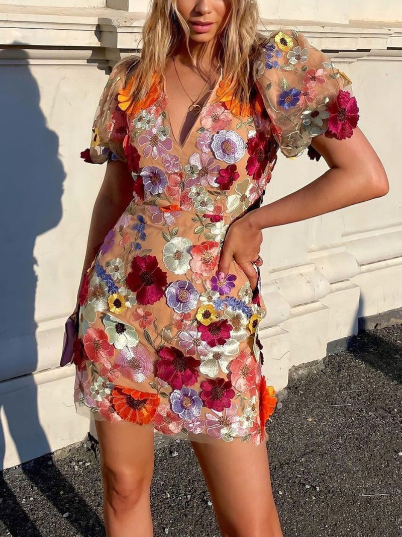 Lily - Mini jurk met bloemenmotief en pofmouwen