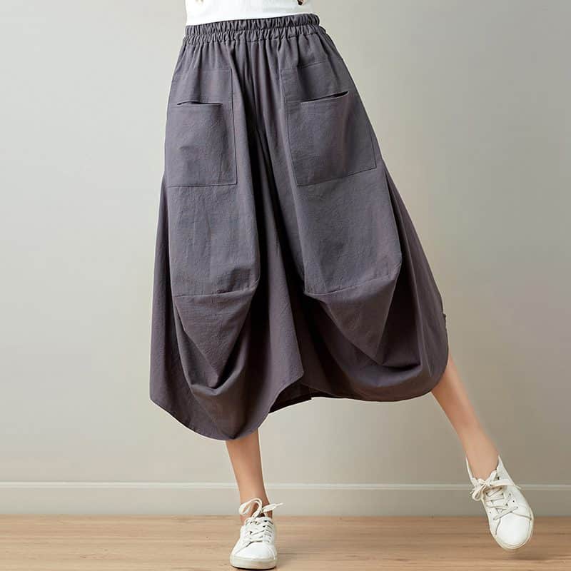 Mira – Relaxte gedrapeerde broek met praktische zakken en vloeiend silhouet
