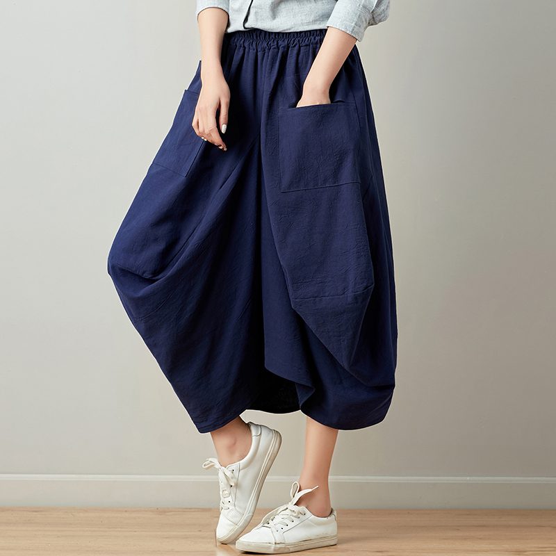 Mira – Relaxte gedrapeerde broek met praktische zakken en vloeiend silhouet