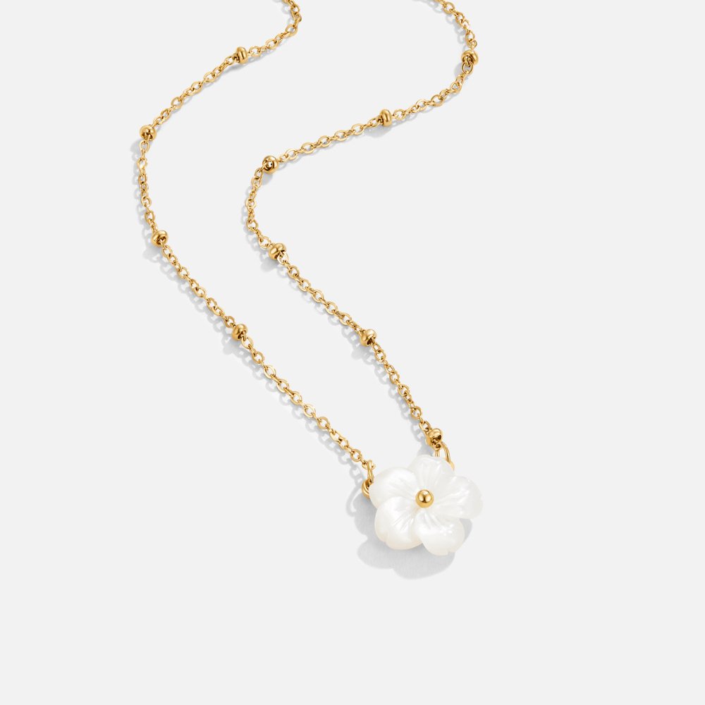 Isla – Bloemenhangerketting met cirkelvormige bedel en delicate gelaagde ketting