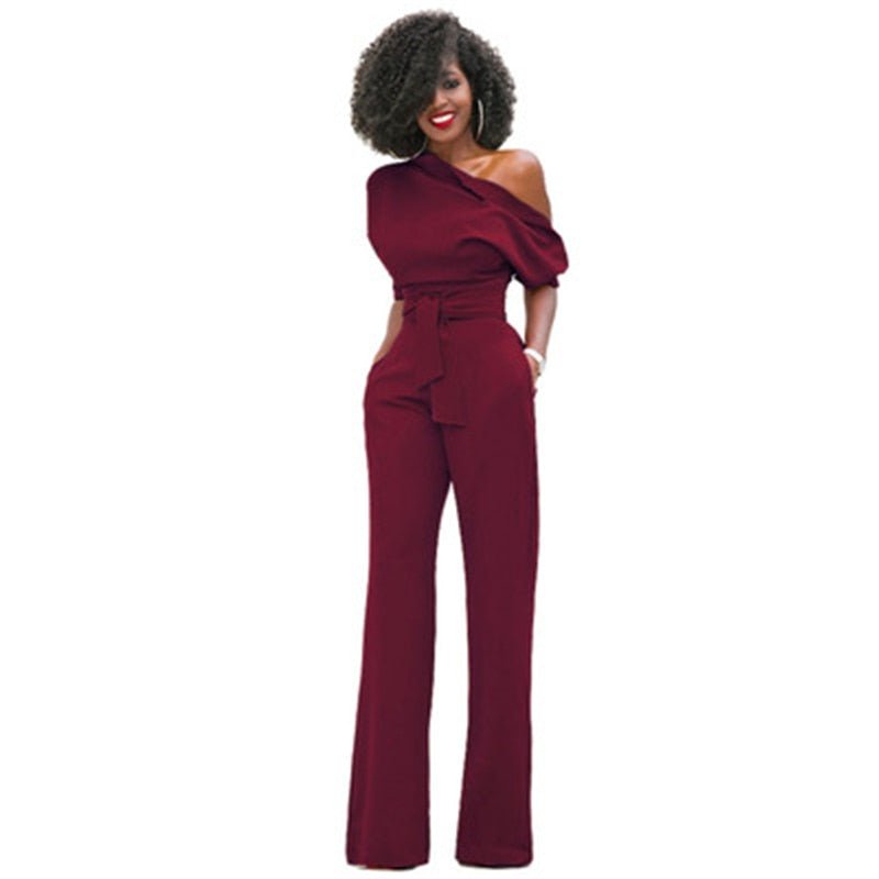 Emilia - Jumpsuit met één schouder en wijde pijp met tailleband